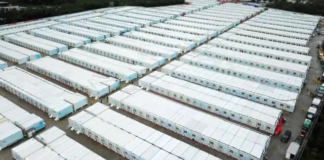 冲锋一线显担任！bti体育智能挖掘机助力长沙方舱医院建设